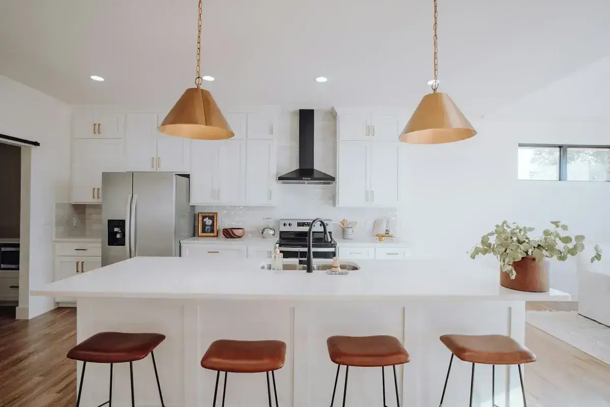 Custom kitchen pendant and recessed lighting installation